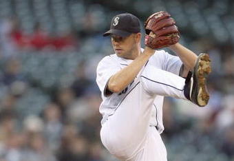 SEATTLE - APRIL 15:  Jarrod Washburn #56 of the Seattle Mariners delivers the pitch during the game against the Los Angeles Angels of Anaheim on April 15, 2009 at Safeco Field in Seattle, Washington. (Photo by Otto Greule Jr/Getty Images)