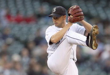 SEATTLE - APRIL 15:  Jarrod Washburn #56 of the Seattle Mariners delivers the pitch during the game against the Los Angeles Angels of Anaheim on April 15, 2009 at Safeco Field in Seattle, Washington. (Photo by Otto Greule Jr/Getty Images)