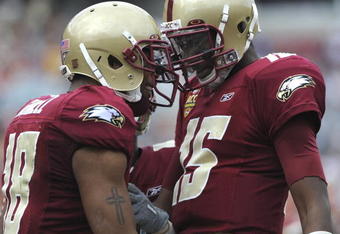 TAMPA, FL - DECEMBER 6: Quarterback Dominique Davis #15 of the Boston College Eagles celebrates a touchdown pass to wide receiver Rich Gunnell #18 against the Virginia Tech Hokies in the 2008 ACC Football Championship game at Raymond James Stadium on December 6, 2008 in Tampa, Florida.  (Photo by Al Messerschmidt/Getty Images)