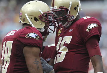 TAMPA, FL - DECEMBER 6: Quarterback Dominique Davis #15 of the Boston College Eagles celebrates a touchdown pass to wide receiver Rich Gunnell #18 against the Virginia Tech Hokies in the 2008 ACC Football Championship game at Raymond James Stadium on December 6, 2008 in Tampa, Florida.  (Photo by Al Messerschmidt/Getty Images)