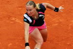 PARIS - JUNE 06:  Svetlana Kuznetsova of Russia hits a backhand during the Women's Singles Final match against Dinara Safina of Russia on day fourteen of the French Open at Roland Garros on June 6, 2009 in Paris, France.  (Photo by Ryan Pierse/Getty Images)