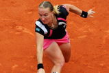 PARIS - JUNE 06:  Svetlana Kuznetsova of Russia hits a backhand during the Women's Singles Final match against Dinara Safina of Russia on day fourteen of the French Open at Roland Garros on June 6, 2009 in Paris, France.  (Photo by Ryan Pierse/Getty Images)