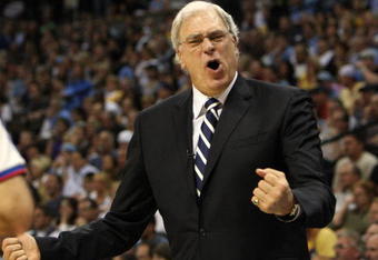 DENVER - MAY 25:  Head coach Phil Jackson of the Los Angeles Lakers coaches against the Denver Nuggets in Game Four of the Western Conference Finals during the 2009 NBA Playoffs at Pepsi Center on May 25, 2009 in Denver, Colorado. NOTE TO USER: User expressly acknowledges and agrees that, by downloading and or using this photograph, User is consenting to the terms and conditions of the Getty Images License Agreement.  (Photo by Jed Jacobsohn/Getty Images)