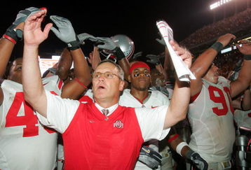 AUSTIN, TX - SEPTEMBER 9:  Head coach Jim Tressel of the Ohio State Buckeyes celebrates a 24-7 win against the Texas Longhorns on September 9, 2006 at Texas Memorial Stadium in Austin, Texas.   (Photo by Ronald Martinez/Getty Images)    