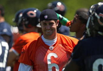 LAKE FOREST, IL - MAY 20: Jay Cutler #6 of the Chicago Bears smiles at a teammate during an organized team activity (OTA) practice on May 20, 2009 at Halas Hall in Lake Forest, Illinois. (Photo by Jonathan Daniel/Getty Images)