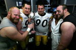 TAMPA, FL - FEBRUARY 01:  (L-R) Chris Hoke #76, Aaron Smith #91 Travis Kirschke #90,  Casey Hampton #98 and Brett Keisel #99 of the Pittsburgh Steelers celebrates with the Vince Lombardi trophy in the locker room after defeating the Arizona Cardinals during Super Bowl XLIII on February 1, 2009 at Raymond James Stadium in Tampa, Florida. The Steelers won the game by a score of 27-23.  (Photo by Al Bello/Getty Images)