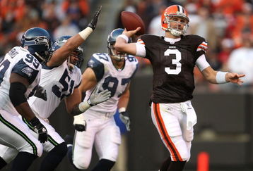 CLEVELAND - NOVEMBER 04:  Derek Anderson #3 of the Cleveland Browns throws a pass under pressure from Rocky Bernard #99, Lofa Tatupu #51 and Patrick Kerney #97 of the Seattle Seahawks on November 4, 2007 at Cleveland Browns Stadium in Cleveland, Ohio. (Photo by Jonathan Daniel/Getty Images)