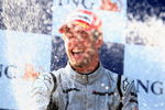 ISTANBUL, TURKEY - JUNE 07:  Jenson Button of Great Britain and Brawn GP celebrates on the podium after winning the Turkish Formula One Grand Prix at Istanbul Park on June 7, 2009, in Istanbul, Turkey.  (Photo by Clive Mason/Getty Images)