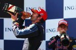 ISTANBUL, TURKEY - JUNE 07:  Second placed Mark Webber (L) of Australia and Red Bull Racing and third placed Sebastian Vettel (R) of Germany and Red Bull Racing celebrate on the podium after the Turkish Formula One Grand Prix at Istanbul Park on June 7, 2009, in Istanbul, Turkey.  (Photo by Paul Gilham/Getty Images)
