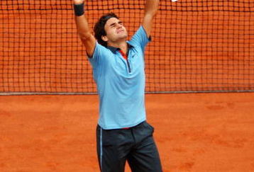 PARIS - JUNE 07:  Roger Federer of Switzerland celebrates victory during the Men's Singles Final match against Robin Soderling of Sweden on day fifteen of the French Open at Roland Garros on June 7, 2009 in Paris, France.  (Photo by Clive Brunskill/Getty Images)