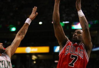 BOSTON - MAY 02:  Ben Gordon #7 of the Chicago Bulls takes a shot as Eddie House #50 of the Boston Celtics defends in Game Seven of the Eastern Conference Quarterfinals during the 2009 NBA Playoffs at TD Banknorth Garden on May 2, 2009 in Boston, Massachusetts. The Celtics defeated the Bulls 109-99. NOTE TO USER: User expressly acknowledges and agrees that, by downloading and or using this photograph, User is consenting to the terms and conditions of the Getty Images License Agreement.  (Photo by Elsa/Getty Images)