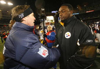 FOXBORO, MA - DECEMBER 9:  Coach Bill Belichick of the New England Patriots shakes hands with Coach Mike Tomlin of the Pittsburgh Steelers at Gillette Stadium December 9, 2007 in Foxboro, Massachusetts. The Patriots won 34-13.  (Photo by Jim Rogash/Getty Images)