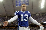 Indianapolis Colts kicker Mike Vanderjagt leads cheers from the field January 4, 2004 at the RCA Dome, Indianapolis, in an AFC Wildcard game.  The Colts defeated the  Denver Broncos 41 - 10.  (Photo by Al Messerschmidt/Getty Images)