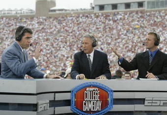 TALLAHASSEE, FL - OCTOBER 26:  ESPN College GameDay announcers (l to r) Chris Fowler, Lee Corso and Kirk Herbstreit comment during the NCAA football game between Notre Dame and Florida State at Doak Campbell Stadium on October 26, 2002 in Tallahassee, Florida.  The Notre Dame Fighting Irish defeated the Florida State Seminoles 34-24.  (Photo by Craig Jones/Getty Images)
