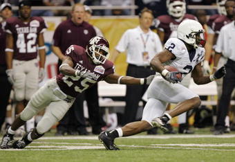 SAN ANTONIO - DECEMBER 29:  Derrick Williams #2 of the Penn State Nittany Lions eludes the reach of Jordan Pugh #25 of the Texas A&M Aggies as he returns a punt during the Valero Alamo Bowl on December 29, 2007 at the Alamodome in San Antonio, Texas.  Penn State won 24-17.  (Photo by Brian Bahr/Getty Images)  