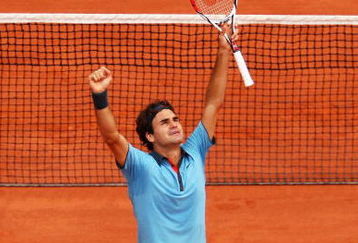 PARIS - JUNE 07:  Roger Federer of Switzerland celebrates victory during the Men's Singles Final match against Robin Soderling of Sweden on day fifteen of the French Open at Roland Garros on June 7, 2009 in Paris, France.  (Photo by Clive Brunskill/Getty Images)