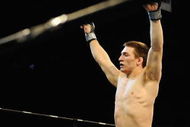 UNCASVILLE, CT - MAY 16: Frank Latina (L) celebrates after beating John Franchi (R) of The Bomb Squad during their bout presented by the International Fighting League at the Mohegan Sun Arena May 16, 2008 in Uncasville, Connecticut.  (Photo by Jeff Zelevansky/Getty Images for IFL)