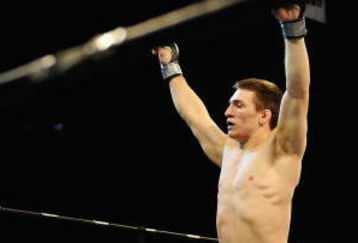 UNCASVILLE, CT - MAY 16: Frank Latina (L) celebrates after beating John Franchi (R) of The Bomb Squad during their bout presented by the International Fighting League at the Mohegan Sun Arena May 16, 2008 in Uncasville, Connecticut.  (Photo by Jeff Zelevansky/Getty Images for IFL)