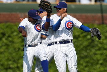 CHICAGO - MAY 29: (L-R) Alfonso Soriano #12, Reed Johnson #9 and Kosuke Fukudome #1 of the Chicago Cubs celebrate a win over the Los Angeles Dodgers on May 29, 2009 at Wrigley Field in Chicago, Illinois. The Cubs defeated the Dodgers 2-1. (Photo by Jonathan Daniel/Getty Images)