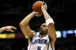 SALT LAKE CITY - APRIL 25:  Carlos Boozer #5 of the Utah Jazz shoots in Game Four of the Western Conference Quarterfinals against the Los Angeles Lakers during the 2009 NBA Playoffs at Energy Solutions Arena on April 25, 2009 in Salt Lake City, Utah.  The Lakers won 108-94.  NOTE TO USER: User expressly acknowledges and agrees that, by downloading and/or using this Photograph, user is consenting to the terms and conditions of the Getty Images License Agreement.  (Photo by Otto Greule Jr/Getty Images)  