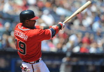 ATLANTA - APRIL 12: Infielder Yunel Escobar #19 of the Atlanta Braves bats against the Washington Nationals April 12, 2009 at Turner Field in Atlanta, Georgia.  (Photo by Al Messerschmidt/Getty Images) 