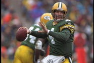 26 Nov 1995:  Quarterback Brett Favre #4 of the Green Bay Packers prepares to throw right to his receiver during the game against the Tampa Bay Buccaneers at Lambeau Field in Green Bay, Wisconsin.  The Packers defeated the Buccaneers 35-13.  Mandatory Cre