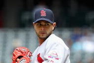 PHOENIX - APRIL 15:  Starting pitcher Joel Pineiro #42 of the St. Louis Cardinals pitches against the Arizona Diamondbacks during the game at Chase Field on April 15, 2009 in Phoenix, Arizona. The Cardinals defeated the Diamondbacks 12-7.  (Photo by Christian Petersen/Getty Images)