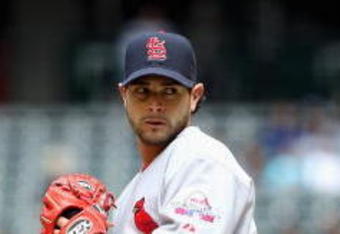 PHOENIX - APRIL 15:  Starting pitcher Joel Pineiro #42 of the St. Louis Cardinals pitches against the Arizona Diamondbacks during the game at Chase Field on April 15, 2009 in Phoenix, Arizona. The Cardinals defeated the Diamondbacks 12-7.  (Photo by Christian Petersen/Getty Images)