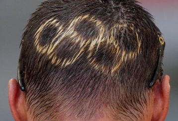 BEIJING - AUGUST 22: The Olympic rings are seen on the head of Kazimir Verkin of Slovakia after his last ever 50km Walk at the National Stadium on Day 14 of the Beijing 2008 Olympic Games on August 22, 2008 in Beijing, China.  (Photo by Mark Dadswell/Getty Images)