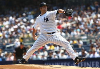 NEW YORK - JUNE 07:  Joba Chamberlain #62 of the New York Yankees pitches against the Tampa Bay Rays during their game on June 7, 2009 at Yankee Stadium in the Bronx borough of New York City.  (Photo by Chris McGrath/Getty Images)