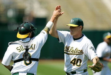 OAKLAND, CA - JUNE 07:  Kurt Suzuki #8 of the Oakland Athletics congratulates relief pitcher Andrew Bailey #40 after the Athletics beat the Baltimore Orioles at the Oakland Coliseum on June 7, 2009 in Oakland, California.  (Photo by Ezra Shaw/Getty Images)