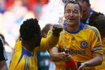LONDON, ENGLAND - MAY 30:  John Terry (R) and John Obi Mikel of Chelsea celebrate victory after the FA Cup sponsored by E.ON Final match between Chelsea and Everton at Wembley Stadium on May 30, 2009 in London, England.  (Photo by Alex Livesey/Getty Images)
