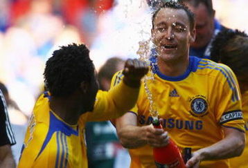 LONDON, ENGLAND - MAY 30:  John Terry (R) and John Obi Mikel of Chelsea celebrate victory after the FA Cup sponsored by E.ON Final match between Chelsea and Everton at Wembley Stadium on May 30, 2009 in London, England.  (Photo by Alex Livesey/Getty Images)