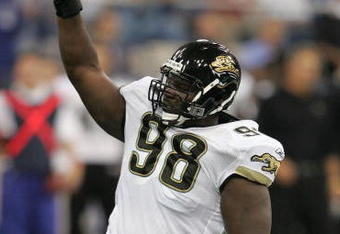 INDIANAPOLIS - SEPTEMBER 24:  John Henderson #98 of the Jacksonville Jaguars celebrates after he recorded a sack against Peyton Manning of the Indianapolis Colts September 24, 2006 at the RCA Dome in Indianapolis, Indiana.The Colts won 21-14.  (Photo by Andy Lyons/Getty Images)