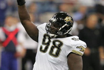 INDIANAPOLIS - SEPTEMBER 24:  John Henderson #98 of the Jacksonville Jaguars celebrates after he recorded a sack against Peyton Manning of the Indianapolis Colts September 24, 2006 at the RCA Dome in Indianapolis, Indiana.The Colts won 21-14.  (Photo by Andy Lyons/Getty Images)