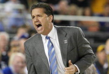 GLENDALE, AZ - MARCH 26:  Head Coach John Calipari of the Memphis Tigers adjusts his team against the Missouri Tigers in the Sweet 16 of the NCAA Division I Men's Basketball Tournament at the University of Phoenix Stadium on March 26, 2009 in Glendale, Arizona.  (Photo by Ronald Martinez/Getty Images)