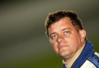 CONCORD, NC - OCTOBER 11: Carl Long, driver of the #08 Dodge, stands on the grid during qualifying for the NASCAR Nextel Cup Series Bank of America 500 at Lowe's Motor Speedway on October 11, 2007 in Concord, North Carolina.  (Photo by Kevin C. Cox/Getty Images for NASCAR)