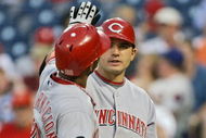 PHILADELPHIA - JUNE 02: Edwin Encarnacion #28 of the Cincinnati Reds gets congratulated by teammate Joey Votto #19 after hitting a home-run during the game against the Philadelphia Phillies on June 2, 2008 at Citizens Bank Park in Philadelphia, Pennsylvania. (Photo by Drew Hallowell/Getty Images)