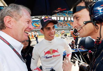 ISTANBUL, TURKEY - JUNE 07:  Sebastien Buemi (C) of Switzerland and Scuderia Toro Rosso and Red Bull Racing Motorsport Consultant Helmut Marko (L) are seen on the grid before during the Turkish Formula One Grand Prix at Istanbul Park on June 7, 2009, in Istanbul, Turkey.  (Photo by Peter Fox/Getty Images)