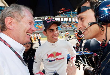 ISTANBUL, TURKEY - JUNE 07:  Sebastien Buemi (C) of Switzerland and Scuderia Toro Rosso and Red Bull Racing Motorsport Consultant Helmut Marko (L) are seen on the grid before during the Turkish Formula One Grand Prix at Istanbul Park on June 7, 2009, in Istanbul, Turkey.  (Photo by Peter Fox/Getty Images)