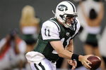 EAST RUTHERFORD, NJ - AUGUST 16:  Kellen Clemens #11 hands off in a pre-season NFL game against the Washington Redskin at Giants Stadium, August 16, 2008 in East Rutherford, New Jersey.  (Photo by Jeff Zelevansky/Getty Images)