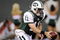 EAST RUTHERFORD, NJ - AUGUST 16:  Kellen Clemens #11 hands off in a pre-season NFL game against the Washington Redskin at Giants Stadium, August 16, 2008 in East Rutherford, New Jersey.  (Photo by Jeff Zelevansky/Getty Images)