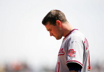 SAN FRANCISCO - MAY 13:  Ryan Zimmerman #11 of the Washington Nationals waits for his hat and glove in between innings of their game against the San Francisco Giants at AT&T Park on May 13, 2009 in San Francisco, California.  (Photo by Ezra Shaw/Getty Images)