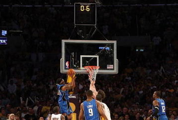 LOS ANGELES, CA - JUNE 07:  Courtney Lee #11 of the Orlando Magic misses a layup with 0.6 seconds left in the fourth quarter over Pau Gasol #16 of the Los Angeles Lakers in Game Two of the 2009 NBA Finals at Staples Center on June 7, 2009 in Los Angeles, California. NOTE TO USER: User expressly acknowledges and agrees that, by downloading and or using this photograph, User is consenting to the terms and conditions of the Getty Images License Agreement.  (Photo by Jed Jacobsohn/Getty Images)
