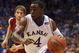 LAWRENCE, KS - FEBRUARY 18: Sherron Collins #4 of the Kansas Jayhawks dribble drives to the basket during the game against the Iowa State Cyclones on February 18, 2009 at Phog Allen Fieldhouse in Lawrence, Kansas. Kansas defeated Iowa State 72-55. (Photo by Jamie Squire/Getty Images)