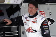 DAYTONA BEACH, FL - FEBRUARY 11:  Johnny Benson, driver of the #1 K&N Toyota, stands in garage area during practice for the NASCAR Camping World Truck Series NextEra Energy Resources 250 at Daytona International Speedway on February 11, 2009 in Daytona Beach, Florida.  (Photo by Jason Smith/Getty Images for NASCAR)