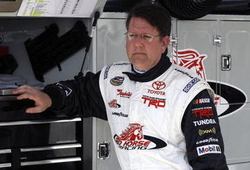 DAYTONA BEACH, FL - FEBRUARY 11:  Johnny Benson, driver of the #1 K&N Toyota, stands in garage area during practice for the NASCAR Camping World Truck Series NextEra Energy Resources 250 at Daytona International Speedway on February 11, 2009 in Daytona Beach, Florida.  (Photo by Jason Smith/Getty Images for NASCAR)