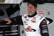 DAYTONA BEACH, FL - FEBRUARY 11:  Johnny Benson, driver of the #1 K&N Toyota, stands in garage area during practice for the NASCAR Camping World Truck Series NextEra Energy Resources 250 at Daytona International Speedway on February 11, 2009 in Daytona Beach, Florida.  (Photo by Jason Smith/Getty Images for NASCAR)