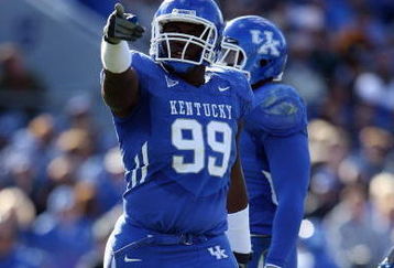 LEXINGTON, KY - NOVEMBER 8:  Jeremy Jarmon #99 of the Kentucky Wildcats points during the game against the Georgia Bulldogs at Commonwealth Stadium on November 8, 2008 in Lexington, Kentucky. (Photo by Andy Lyons/Getty Images)