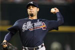 PHOENIX - MAY 30:  Relief pitcher Mike Gonzalez #51 of the Atlanta Braves pitches against the Arizona Diamondbacks during the major league baseball game at Chase Field on May 30, 2009 in Phoenix, Arizona. The Diamondbacks defeated the Braves 3-2.  (Photo by Christian Petersen/Getty Images)